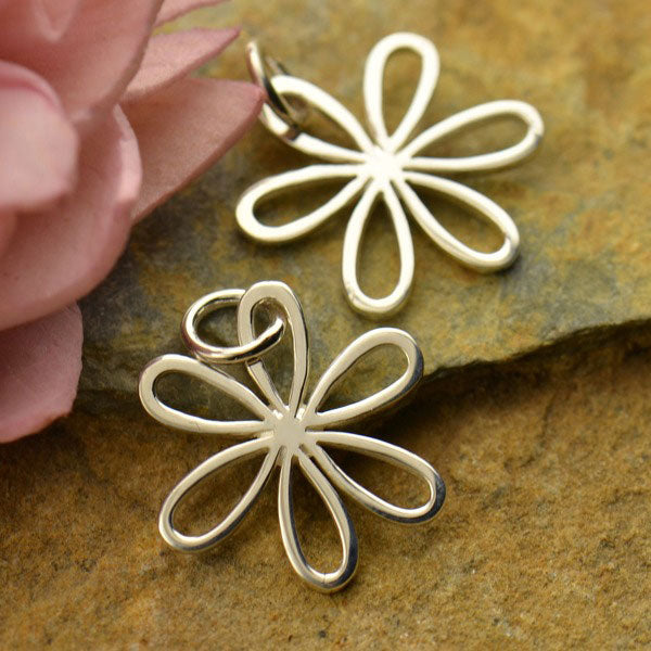Sterling silver daisy flower charm.